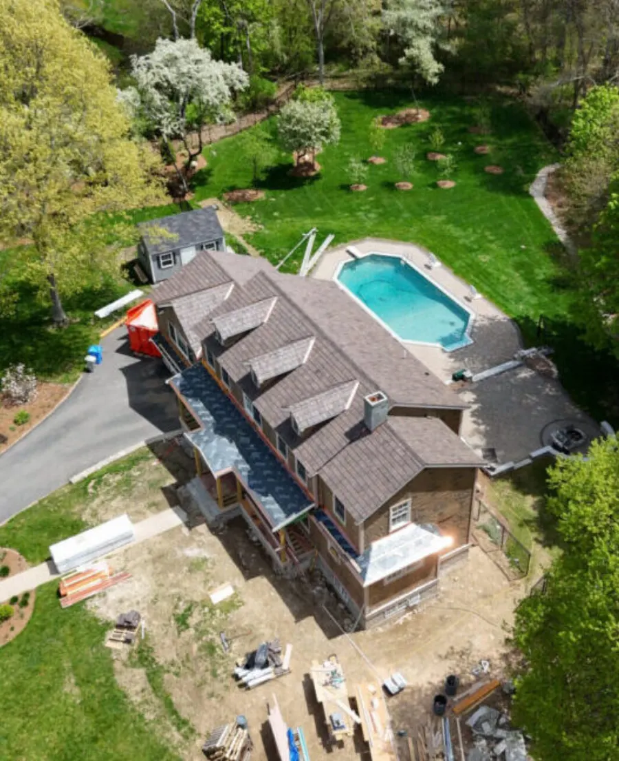 Aerial view of a Brava cedar shake roof with copper accents in Holliston, MA